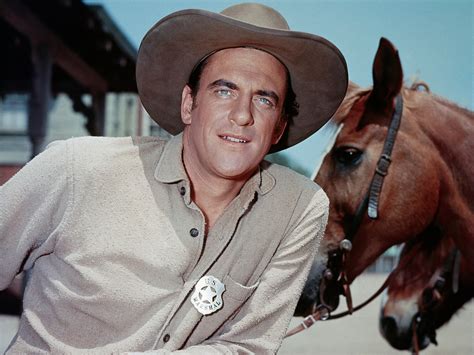 Gunsmoke! A Timeless Western Drama Exploring Lawlessness and Redemption through James Arness' Iconic Performance!